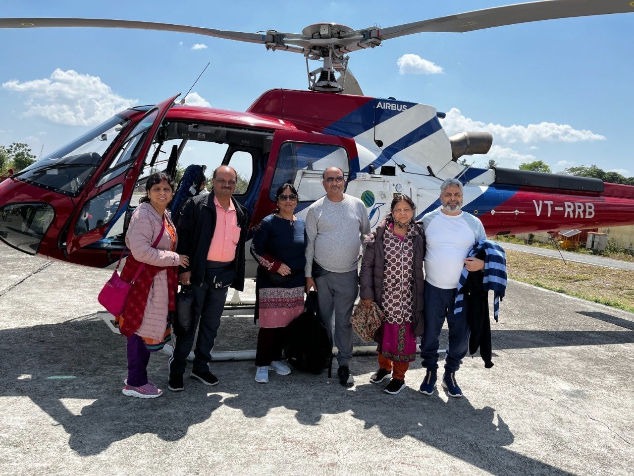 Happy yatris with helicopter